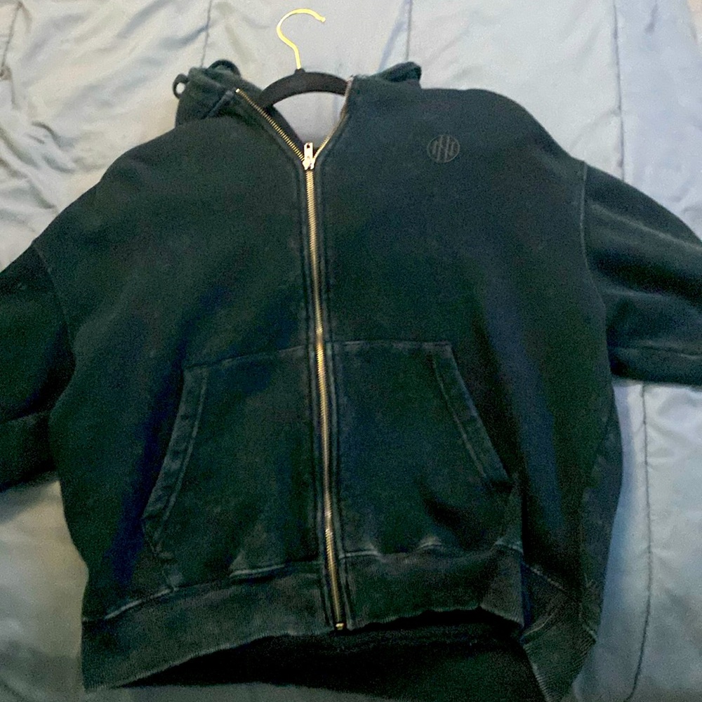 Black shaded jacket, only word ones small men